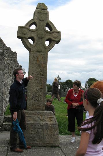 Docent&Kate.jpg - Sean, our guide explains the replica of the South Cross (CN)