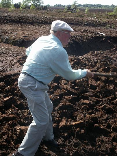 PICT0964.JPG - Howard J Dalton tries his hand at digging the peat (MD)