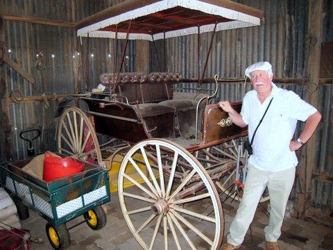 pat_fripm_0377.JPG - Paddy Dalton admires an old carriage in the tin shed (Fairview)