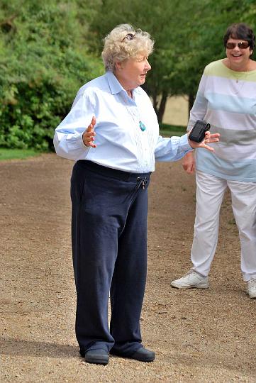 dp_sun_KangaroobieHouse4.jpg - Another shot of Trish telling the storey of the addition of a generator and her father wiring the house for electricity (DP)
